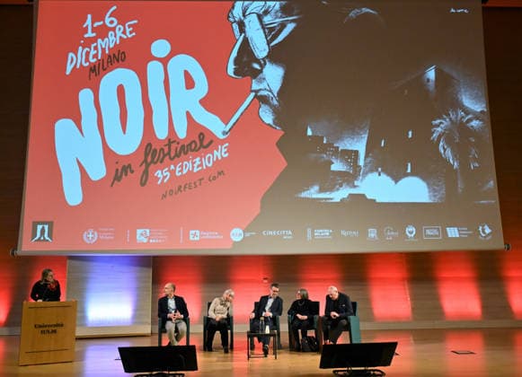 Milan, Italy Mick Herron receives the Raymond Chandler Award at the Noir in Festival with a masterclass at IULM. In the photo: Mick Herron during the presentation of Valentina Garavaglia, Rector of IULM University.  Copyright: xNickxZonnax xipa-agency.netx xNickxZonnax IPA_Agency_IPA68737811