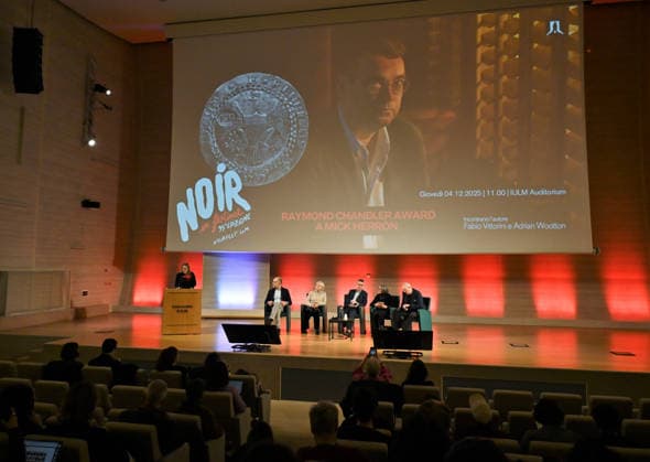 Milan, Italy Mick Herron receives the Raymond Chandler Award at the Noir in Festival with a masterclass at IULM. In the photo: Mick Herron during the presentation of Valentina Garavaglia, Rector of IULM University.  Copyright: xNickxZonnax xipa-agency.netx xNickxZonnax IPA_Agency_IPA68737814