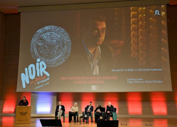 Milan, Italy Mick Herron receives the Raymond Chandler Award at the Noir in Festival with a masterclass at IULM. In the photo: Mick Herron during the presentation of Valentina Garavaglia, Rector of IULM University.  Copyright: xNickxZonnax xipa-agency.netx xNickxZonnax IPA_Agency_IPA68737816