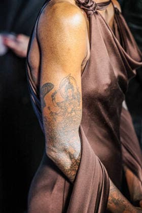 December 4, 2025, Santa Barbara, Ca, USA: Cynthia ErivoÃ¢â‚¬â ¢s tattoo on her arm of a Buddha, as she is on the Red Carpet at the ritzy, oceanfront, Ritz Carton Bacara resort for the Santa Barbara International Film Festival (SBIFF) fundraiser where she will be receiving the prestigious Kirk Douglas Award. Santa Barbara USA - ZUMAk144 20251204_znp_k144_010 Copyright: xAmyxKatzx