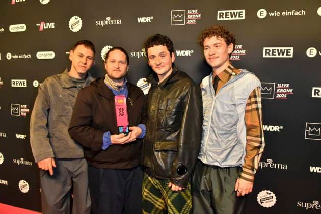 ABBbielefeld Province , Vincent Waizenegger, Moritz Boesing,Robin Schmid, Leon Sennewald Prizewinners with Krone Saenger on the red carpet at the WDR Music Prize 1 Live Krone award ceremony at the Lokschuppen Bielefeld on 04 12 2025 NRW Germany