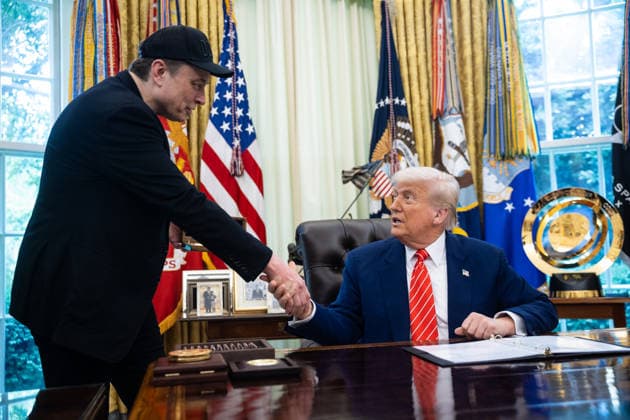 Elon Musk and President Donald Trump shake hands during a press conference in the Oval Office at the White House in Washington, DC, in this file photo taken May 30, 2025. File photo by Francis Chung  POY2025DC032 FRANCISxCHUNG