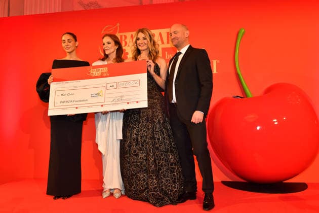 Ann Kathrin Götze, Marcia Cross, Frauke Ludowig and Andreas Lehmann Handing over the check Mon Cheri Barbara Day Charity Residence Munich 04 December 2025