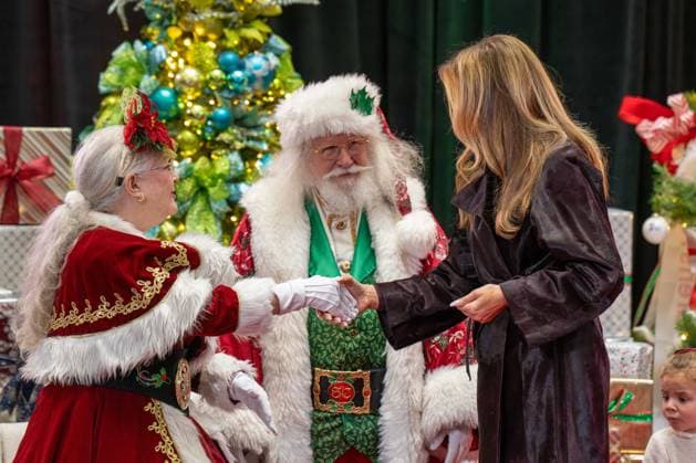 December 5, 2025, Washington, District Of Columbia, USA: First Lady MELANIA TRUMP shakes Mrs. ClausÃ¢â‚¬â ¢ hand after reading a book to a group of children at the ChildrenÃ¢â‚¬â ¢s National Hospital. Washington USA - ZUMAs365 20251205_znp_s365_006 Copyright: xJoeyxSussmanx