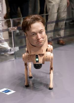 December 05, 2025 - Miami Beach, Florida, USA - A hyper-realistic Elon Musk robotic dog by the artist Beeple at the 2025 Art Basel Miami Beach. Miami Beach USA - ZUMAce6_ 20251205_zaf_ce6_001 Copyright: xBrianxCahnx