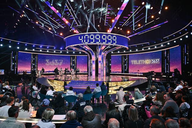 The Telethon show in Paris FA Attendees watch the Telethon show on France Television in Paris on December 5, 2025. Photo by Firas Abdullah ABACAPRESS.COM Paris Ile-de-France France  Copyright: xAbdullahxFiras ABACAx