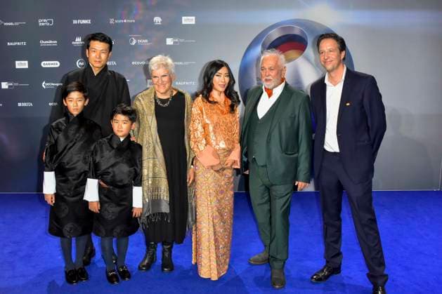 ABBduesseldorf H R H Princess Dechan Yangzom Wangchuck and Husband Dasho Tandin Namgyel is the daughter of the fourth King of Bhutan Jigme Singye Wangchuck as guests on the blue carpet at the 18th German Sustainability Award 2025 ceremony at the Maritim Hotel on 05 12 2025 NRW Germany