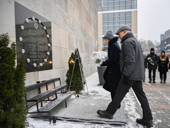 December 6, 2025, Montreal, Pq, Canada: Maud Cohen, President of Ecole Polytechnique, left, and Pierre Langlois, Director of Academic Affairs and Student Experience, lay flowers at a memorial plaque for the victims of the 1989 Ecole Polytechnique massacre in Montreal, Saturday, December 6, 2025. Today marks the 36th anniversary of the shooting by an anti-feminist which left 14 women dead and 13 others injured. Montreal Canada - ZUMAc35_ 20251206_zaf_c35_001 Copyright: xGrahamxHughesx