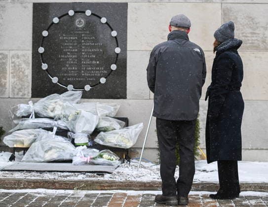 December 6, 2025, Montreal, Pq, Canada: Maud Cohen, president of Ecole Polytechnique, right, and Pierre Langlois, director of academic affairs and student experience, look on after laying flowers at a memorial plaque for the victims of the 1989 Ecole Polytechnique massacre in Montreal, Saturday, Dec. 6, 2025. Today marks the 36th anniversary of the shooting by an anti-feminist that left 14 women dead and 13 others injured. Montreal Canada - ZUMAc35_ 20251206_zaf_c35_010 Copyright: xGrahamxHughesx