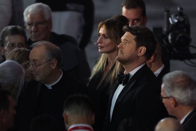 Vatican City, Italy - December 6, 2025: Father Marco Frisina, Serena Autieri, Michael Steven Buble. Pope Leo XIV attends the concert for the poor with Canadian singer Michael Steven Buble and Serena Autieri held in the Paul VI Hall in the Vatican.  Copyright: xmarcoxiacobuccix xipa-agency.netx xmarcoxiacobuccix IPA_Agency_IPA68835657