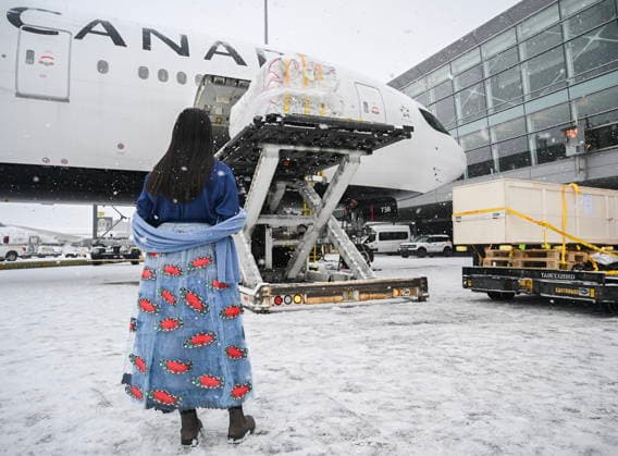 December 6, 2025, Montreal, Pq, Canada: Katisha Paul of the Lil wat and Tsartlip Nations looks on as indigenous artifacts and cultural items are unloaded at Trudeau Airport in Montreal, Saturday, December 6, 2025, after they were returned by the Vatican. Montreal Canada  - ZUMAc35_ 20251206_zaf_c35_028 Copyright: xGrahamxHughesx