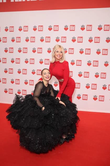 Donation gala A Heart for Children 2025 Kristina Vogel and Patrice Eva Fischer at the TV donation gala A Heart for Children at Studio Adlershof on 06 12 2025 in Berlin Copyright: xEventpressxKochanx