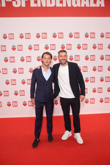 Donation gala A Heart for Children 2025 Jonas Gnauck and Lukas Podolski at the TV donation gala A Heart for Children at Studio Adlershof on 06 12 2025 in Berlin Copyright: xEventpressxKochanx