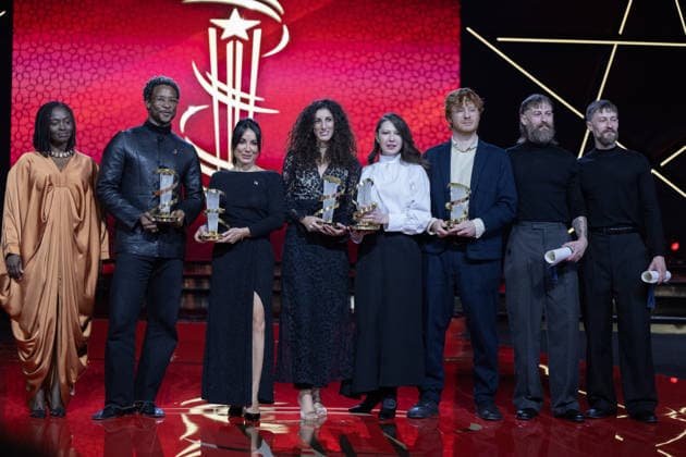 22nd International Marrakech Film Festival MARRAKECH, MOROCCO – DECEMBER 6: Senegalese-French actress Aissa Maiga (L), British-Nigerian director Akinola Davies Jr. (2nd L), French-Tunisian director Erige Sehiri (3rd L), singer-songwriter Jehan Barbur (4th L), director Vladlena Sandu (5th L), British director Oscar Hudson (6th L), British actor Elliott Tittensor (7th left) and British actor Luke Tittensor (R) pose on stage after receiving their awards during the 22nd International Marrakech Film Festival awards ceremony on December 6, 2025, in Marrakech, Morocco. Abu Adem Muhammed Anadolu Marrakech Morocco. Editorial use only. Please get in touch for any other usage. Copyright: x2025xAnadoluxAbuxAdemxMuhammedx