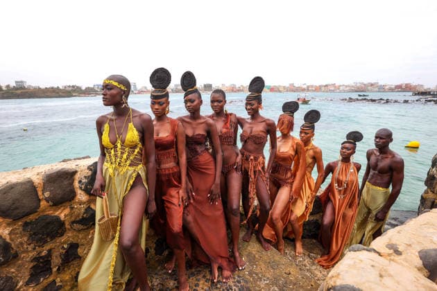 23rd Dakar Fashion Week held on fishing boats DAKAR, SENEGAL – DECEMBER 6: Models showcase designs aboard fishing boats off Ngor Island during the 23rd Dakar Fashion Week, organized by Senegalese-French designer Adama N’Diaye, founder of the brand Adama Paris, on December 6, 2025, in Dakar, Senegal. Cem Ozdel Anadolu Dakar Senegal. Editorial use only. Please get in touch for any other usage.  Copyright: x2025xAnadoluxCemxOzdelx