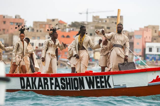 23rd Dakar Fashion Week held on fishing boats DAKAR, SENEGAL – DECEMBER 6: Models showcase designs aboard fishing boats off Ngor Island during the 23rd Dakar Fashion Week, organized by Senegalese-French designer Adama N’Diaye, founder of the brand Adama Paris, on December 6, 2025, in Dakar, Senegal. Cem Ozdel Anadolu Dakar Senegal. Editorial use only. Please get in touch for any other usage.  Copyright: x2025xAnadoluxCemxOzdelx