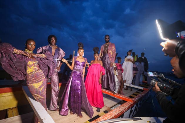 23rd Dakar Fashion Week held on fishing boats DAKAR, SENEGAL – DECEMBER 6: Models showcase designs aboard fishing boats off Ngor Island during the 23rd Dakar Fashion Week, organized by Senegalese-French designer Adama N’Diaye, founder of the brand Adama Paris, on December 6, 2025, in Dakar, Senegal. Cem Ozdel Anadolu Dakar Senegal. Editorial use only. Please get in touch for any other usage.  Copyright: x2025xAnadoluxCemxOzdelx