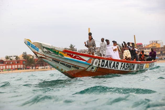 23rd Dakar Fashion Week held on fishing boats DAKAR, SENEGAL – DECEMBER 6: Models showcase designs aboard fishing boats off Ngor Island during the 23rd Dakar Fashion Week, organized by Senegalese-French designer Adama N’Diaye, founder of the brand Adama Paris, on December 6, 2025, in Dakar, Senegal. Cem Ozdel Anadolu Dakar Senegal. Editorial use only. Please get in touch for any other usage.  Copyright: x2025xAnadoluxCemxOzdelx