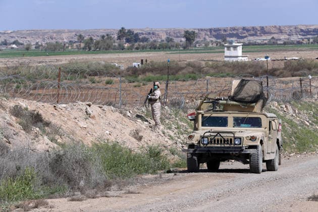 U.S. handover of al-Qaim base ANBAR, IRAQ - MARCH 19 : A soldier from the US-led coalition is seen at the Al-Qaim Military Base in Iraq’s Anbar province, west of Baghdad, on March 19, 2020. The US-led coalition forces handover the Al-Qaim Military Base to the Iraqi Army. Enbar Iraq. Editorial use only. Please get in touch for any other usage.  Copyright: x2025xAnadoluxMurtadhaxAl-Sudanix