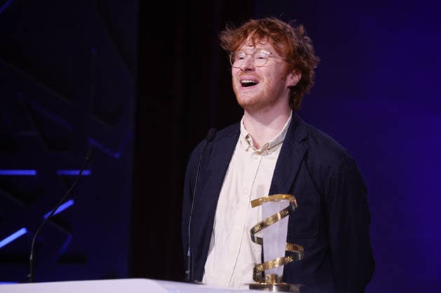 Oscar Hudson is seen on stage after receiving the Best Director Award for the film Straight Circle during the Closing Ceremony during the 22nd Marrakech International Film Festival Marrakech, Morocco 06 12 2025 451320 2025 12 06 MARRAKECH Morocco  Copyright: xRomualdxMeigneuxx xStarfacex STAR_451320_065