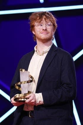 Oscar Hudson is seen on stage after receiving the Best Director Award for the film Straight Circle during the Closing Ceremony during the 22nd Marrakech International Film Festival Marrakech, Morocco 06 12 2025 451320 2025 12 06 MARRAKECH Morocco  Copyright: xRomualdxMeigneuxx xStarfacex STAR_451320_069