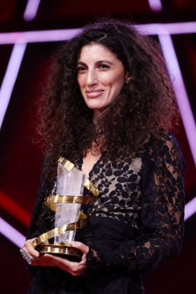 Jihan Kikhia poses on stage after receiving the Jury Prize for the film My Father and Qaddafi during the Closing Ceremony during the 22nd Marrakech International Film Festival Marrakech, Morocco 06 12 2025 451320 2025 12 06 MARRAKECH Morocco  Copyright: xRomualdxMeigneuxx xStarfacex STAR_451320_088