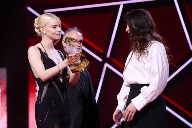L R Anya Taylor Joy, Vladlena Sandu and Karim Aïnouz are seen on stage after receiving the Jury Prize Award for the film Memory during the Closing Ceremony during the 22nd Marrakech International Film Festival Marrakech, Morocco 06 12 2025 451320 2025 12 06 MARRAKECH Morocco  Copyright: xRomualdxMeigneuxx xStarfacex STAR_451320_096