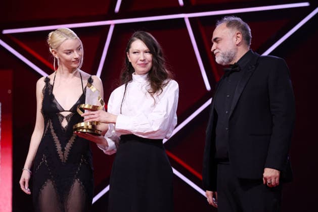 L R Anya Taylor Joy, Vladlena Sandu and Karim Aïnouz are seen on stage after receiving the Jury Prize Award for the film Memory during the Closing Ceremony during the 22nd Marrakech International Film Festival Marrakech, Morocco 06 12 2025 451320 2025 12 06 MARRAKECH Morocco  Copyright: xRomualdxMeigneuxx xStarfacex STAR_451320_097