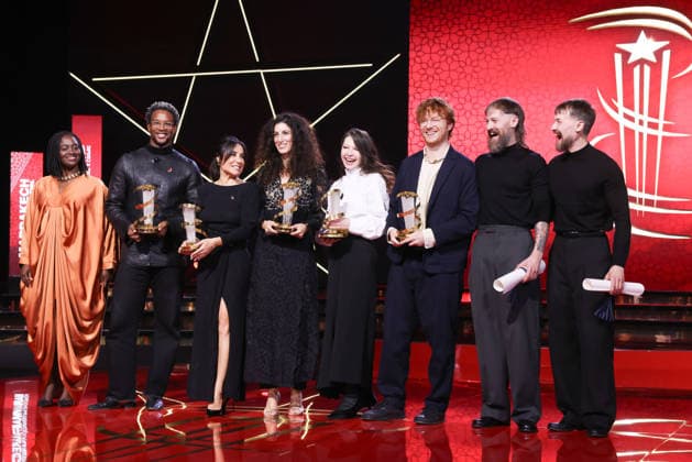 L R Aïssa Maïga, Akinola Davies Jr , Erige Sehiri, Jihan Kikhia, Vladlena Sandu, Oscar Hudson, Elliott Tittensor and Luke Tittensor pose onstage with their prizes during the Closing Ceremony during the 22nd Marrakech International Film Festival Marrakech, Morocco 06 12 2025 451320 2025 12 06 MARRAKECH Morocco  Copyright: xRomualdxMeigneuxx xStarfacex STAR_451320_120