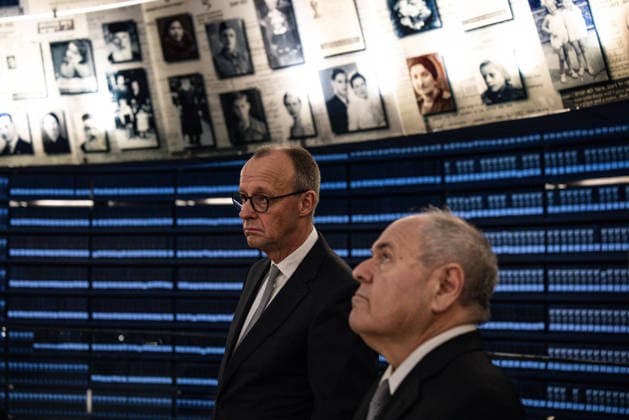 Dani Dayan Dani Dayan (R), chairman of the Yad Vashem Holocaust Memorial Museum, stands with German Chancellor Friedrich Merz at the museum s Hall of Names in Jerusalem, Israel, on Sunday, December 7, 2025. Pool  JERX2025120708 JOHNxWESSELS