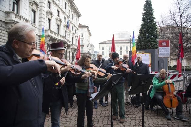 Milan, Piazza della Scala, On the occasion of the premiere at La Scala of A Lady Macbeth in the Mtsensk District by Dmitry Shostakovich for the 2025-2026 season, a demonstration The ceasefire is a Zionist lie, the genocide and ethnic cleansing continue. Let s bring solidarity to the center of Milan! With CUB, the Palestinian Association in Italy (API), in a separate area, the CIGL demonstration and some musicians from the Teatro alla Scala will play Choir of Jewish Slaves, Va Pensiero  Copyright: xFrancescoxEnriquezx xipa-agency.netx xFrancescoxEnriquezx IPA_Agency_IPA68873543