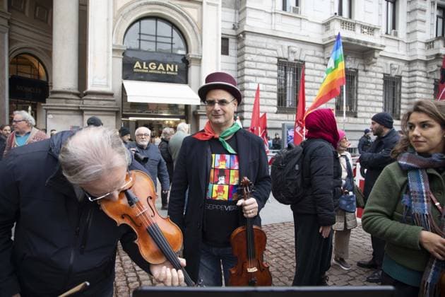 Milan, Piazza della Scala, On the occasion of the premiere at La Scala of A Lady Macbeth in the Mtsensk District by Dmitry Shostakovich. for the 2025-2026 season, Presidium The ceasefire is a Zionist lie, genocide and ethnic cleansing continue. Let s bring solidarity to the center of Milan! With CUB, Association of Palestinians in Italy (API), in a separate part the CIGL presidium and some musicians of the Teatro alla Scala play  Copyright: xFrancescoxEnriquezx xipa-agency.netx xFrancescoxEnriquezx IPA_Agency_IPA68873603