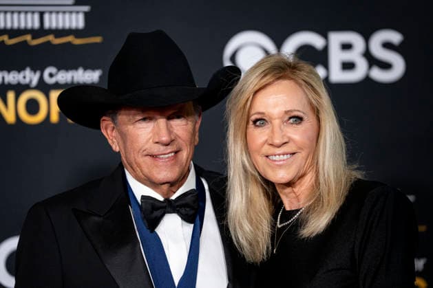 Kennedy Center Honoree George Straight and his wife, Norma Straight, arrive on the red carpet for the 48th annual Kennedy Center Honors at the Kennedy Center in Washington DC on Sunday, December 7, 2025. President Donald Trump will host this year s event, which honors songwriter George Strait, actors Michael Crawford and Sylvester Stallone, singer Gloria Gaynor, and the rock band Kiss.  WAP20251207533 BONNIExCASH
