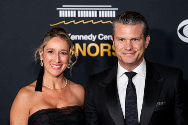 Defense Secretary Pete Hegseth and his wife, Jennifer Rauchet, arrive on the red carpet for the 48th annual Kennedy Center Honors at the Kennedy Center in Washington DC on Sunday, December 7, 2025. President Donald Trump will host this year s event, which honors songwriter George Strait, actors Michael Crawford and Sylvester Stallone, singer Gloria Gaynor, and the rock band Kiss.  WAP20251207571 BONNIExCASH