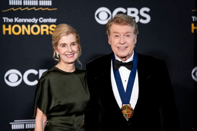 English actor and Kennedy Center Honoree Michael Crawford and Natasha MacAller arrive on the red carpet for the 48th annual Kennedy Center Honors at the Kennedy Center in Washington DC on Sunday, December 7, 2025. President Donald Trump will host this year s event, which honors songwriter George Strait, actors Michael Crawford and Sylvester Stallone, singer Gloria Gaynor, and the rock band Kiss.  WAP20251207525 BONNIExCASH