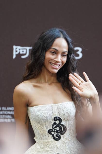 SANYA, CHINA - DECEMBER 08: American actress Zoe Saldana attends the China premiere of film Avatar: Fire and Ash on December 8, 2025 in Sanya, Hainan Province of China.  Copyright: xVCGx 111608409401