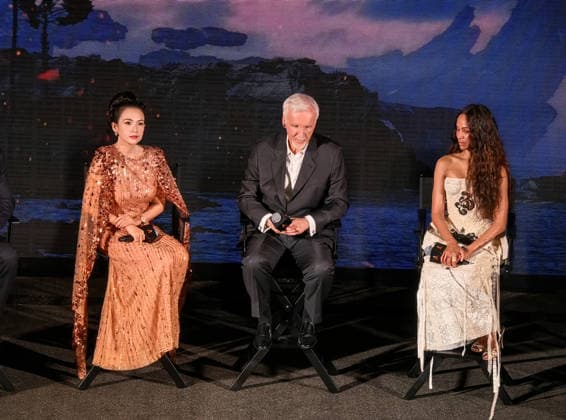 SANYA, CHINA - DECEMBER 08: (L-R) Actress Zhang Ziyi, director James Cameron, American actress Zoe Saldana attend the China premiere of film Avatar: Fire and Ash on December 8, 2025 in Sanya, Hainan Province of China.  Copyright: xVCGx 111608478022