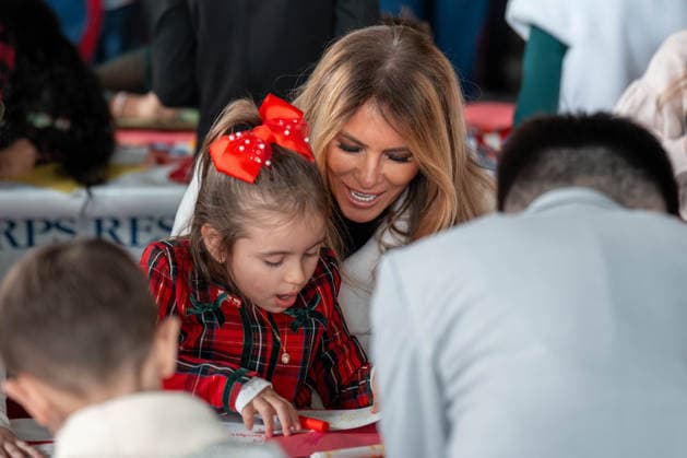 December 8, 2025, Quantico, Virginia, USA: First Lady MELANIA TRUMP and a young girl admire a holiday card the girl just made during a Toys for Tots event at Marine Corps Base Quantico. Quantico USA - ZUMAs365 20251208_znp_s365_002 Copyright: xJoeyxSussmanx