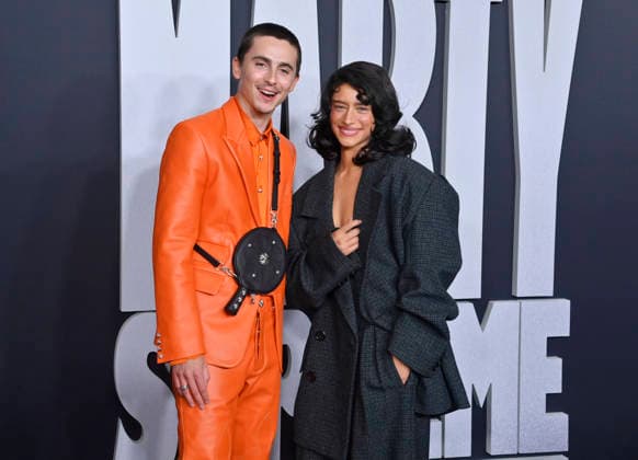 Cast members Timothee Chalamet (L) and Odessa A zion attend the special screening of the motion picture sports drama Marty Supreme at the Samuel Goldwyn Theater in Beverly Hills, California on Monday, December 8, 2025. Storyline: Marty Mauser, a young man with a dream no one respects, goes to hell and back in pursuit of greatness.  LAP20251208823 JIMxRUYMEN