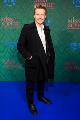 ABBberlin Max von Pufendorf actor on the blue carpet at the cinema premiere of the Amazon prime series of MISS SOPHIE SAME PROCEDURE AS EVERY YEAR at Claerchens Ballhaus on 08 12 2025 Berlin Berlin Germany