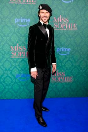 ABBberlin Vladimir Korneev actress on the blue carpet at the cinema premiere of the Amazon prime series of MISS SOPHIE SAME PROCEDURE AS EVERY YEAR at Claerchens Ballhaus on 08 12 2025 Berlin Berlin Germany