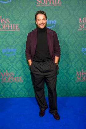 ABBberlin Kostja Ullmann actor on the blue carpet at the cinema premiere of the Amazon prime series of MISS SOPHIE SAME PROCEDURE AS EVERY YEAR at Claerchens Ballhaus on 08 12 2025 Berlin Berlin Germany