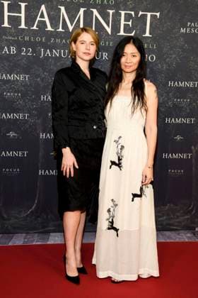 ABBberlin Jessie Buckley Irish actress with Chloe Zhao Chinese film director, guest on the red carpet at the German premiere of the movie Hamnet at Delphi Filmpalast on 08 12 2025 in Berlin Berlin Germany