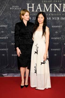 ABBberlin Jessie Buckley Irish actress with Chloe Zhao Chinese film director, guest on the red carpet at the German premiere of the movie Hamnet at Delphi Filmpalast on 08 12 2025 in Berlin Berlin Germany