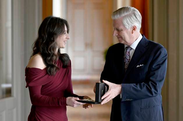King Philippe presents Nina Derwael with the insignia of Grand Officer of the Order of Leopold BRUSSELS, BELGIUM - DECEMBER 09 : King Philippe presents Nina Derwael with the insignia of Grand Officer of the Order of Leopold. This honorary distinction crowns the exceptional career of the famous Belgian gymnast, notably her titles of Olympic champion (1x), world champion (2x) and European champion (4x) on the uneven bars and balance beam on December 9, 2025 in Brussels, Belgium, 09 12 2025 Brussels Belgium  Copyright: xDidierxLebrunx