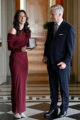 King Philippe presents Nina Derwael with the insignia of Grand Officer of the Order of Leopold BRUSSELS, BELGIUM - DECEMBER 09 : King Philippe presents Nina Derwael with the insignia of Grand Officer of the Order of Leopold. This honorary distinction crowns the exceptional career of the famous Belgian gymnast, notably her titles of Olympic champion (1x), world champion (2x) and European champion (4x) on the uneven bars and balance beam on December 9, 2025 in Brussels, Belgium, 09 12 2025 Brussels Belgium  Copyright: xDidierxLebrunx