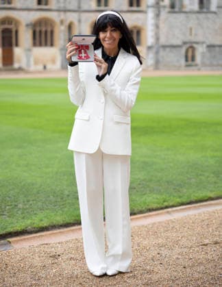 . 09 12 2025. Windsor , United Kingdom. TV presenter Claudia Winkleman with her MBE after an Investiture at Windsor Castle, United Kingdom.  xStephenxLockx xi-Imagesx IIM-26443-0006