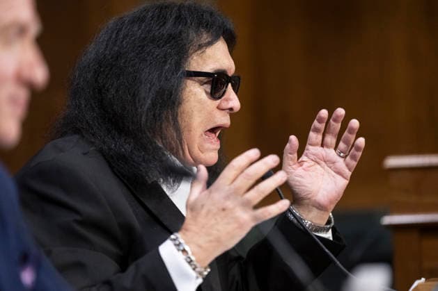December 9, 2025, Washington, District Of Columbia, USA: Former KISS band member Gene Simmons speaks during Senate Committee on the Judiciary Subcommittee on Intellectual Property hearings to examine balancing the interests of local radio, songwriters, and performers in the digital age in the Dirksen Senate office building in Washington, DC on Sunday, December 9, 2025 Washington USA - ZUMAs152 20251209_faa_s152_001 Copyright: xMattiexNeretinx
