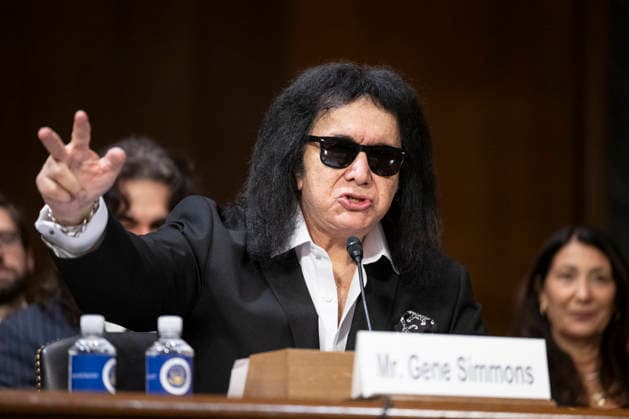 December 9, 2025, Washington, District Of Columbia, USA: Former KISS band member Gene Simmons speaks during Senate Committee on the Judiciary Subcommittee on Intellectual Property hearings to examine balancing the interests of local radio, songwriters, and performers in the digital age in the Dirksen Senate office building in Washington, DC on Sunday, December 9, 2025 Washington USA - ZUMAs152 20251209_faa_s152_037 Copyright: xMattiexNeretinx