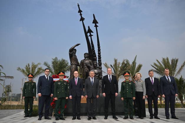VIETNAM, HANOI - DECEMBER 10, 2025: Russian Security Council Secretary Sergei Shoigu (5th L), Russia s Ambassador to Vietnam Gennady Bezdetko (4th L) pose for a group photo in front of a monument honouring Soviet military experts who participated in Vietnam s struggle against the US intervention in 1955-1975 Hanoi Vietnam  - ZUMAt113 20251210_zaa_t113_009 Copyright: xKirillxZykovx
